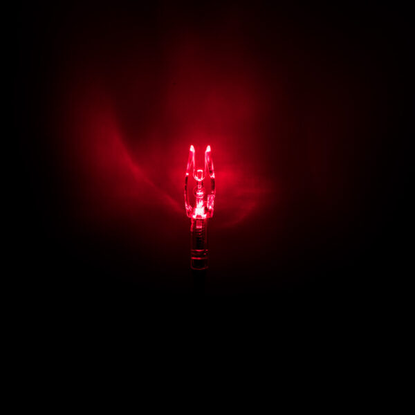 single red lighted nock illuminated in dark